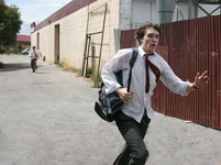 photo of Jamie running down an alleyway